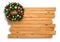 Colorful natural pine Christmas wreath on cedar