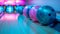 Colorful neon bowling balls on polished lane in modern bowling alley, vibrant and bright setting