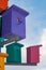 Colorful nesting boxes on blue sky