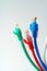 Colorful network cables switch on white background close up