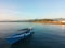 Colorful ocean with a boat ready to sail