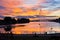 Colorful october evening reflections on Ada lake surface in Belgrade