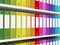 Colorful office folders on the shelves