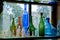 Colorful old bottles on windowsill