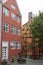 Colorful old town street with wooden rustic houses, typical Danish capital architecture