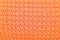 Colorful orange crochet knitted patterns texture for background