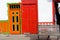 Colorful orange and red doors in Salento, Colombia