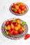 Colorful organic cherry tomatoes on silver plates,