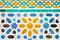 Colorful ornate pattern of moorish tile decorations in alhambra