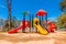 Colorful outdoor modern children playground without children in the play yard