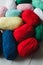 Colorful oval acrylic colorful wool yarn thread skeins background