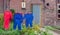 Colorful overalls on the clothesline of a farm