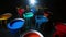 Colorful paint of a metal bucket. Isolated on a black background.