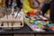 Colorful paint tubes on a table with paints used for face art.