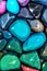 A colorful painting of a collection of colorful stones.