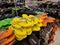 Colorful pair of slippers and shoes displayed for sale.