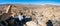 Colorful panorama of boulders desert scenery mountains at sunset in Yucca Valley California near Joshua Tree National Park with