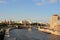Colorful panorama of Moscow - Kremlin, Moskva river embankment, Big stone bridge, pleasure boat,, Russia, Europe.