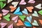 Colorful paper airplanes on wooden table background