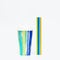 Colorful paper cup or container for coffee or cocktail and paper drinking straws Bright summer package for beverage.