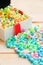 Colorful of paper fold christmas stars spilling