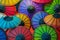 Colorful paper umbrellas on store shelves. Laos