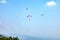 Colorful paramotor in the sky.