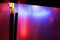 Colorful Party background fence with reflections of multicolored neon lights