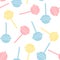Colorful pastel lollipops on white background in flat style.