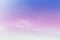 Colorful pastel sunrise or sunset sky with puffy fluffy soft clouds & white cloudscape