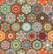 Colorful patchwork pattern. Seamless vector design. Hexagonal tiles with different ornaments