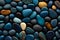 Colorful pebble stones as background, closeup of photo