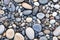 Colorful pebble stones on the beach, closeup of photo. Generative AI