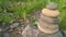 Colorful pebbles stacked on the rock. Feng shui