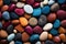 colorful pebbles texture background, closeup multicolored smooth stones