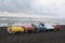 Colorful pedalo paddle boats on the beach, overcast, clouds, waves