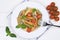 Colorful Penne Rigate noodles pasta meal from above