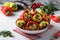 Colorful pepper stuffed with eggplant, onions and carrots on light gray background, Vegetarian food