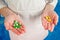 Colorful pharmaceutical capsules in hands