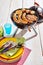 Colorful picnic plates and utensils at a barbecue