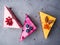 A colorful Pieces of No-bake Fresh cranberry, blueberry, sea buckthorn Cheesecake