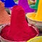 Colorful piles of powdered dyes used for Holi festival