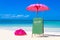 Colorful pillows and umbrella on tropical sea and beach b