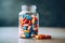 Colorful pills in a glass jar on wooden table with copy space