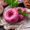 Colorful pink donuts on a grunge rusty table