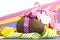 Colorful pink, yellow and purple theme Happy Easter theme with chocolate egg and gift box