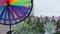 Colorful pinwheel spinning, weather wind vane, garden decoration in USA. Rainbow symbol of childhood, fantasy and imagination