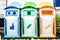 Colorful plastic bins for different waste types