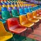 Colorful plastic seats arranged in rows create dynamic stadium scene