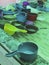 Colorful plastic water dippers usually used by Muslims to scoop water for ablution purification before performing prayers